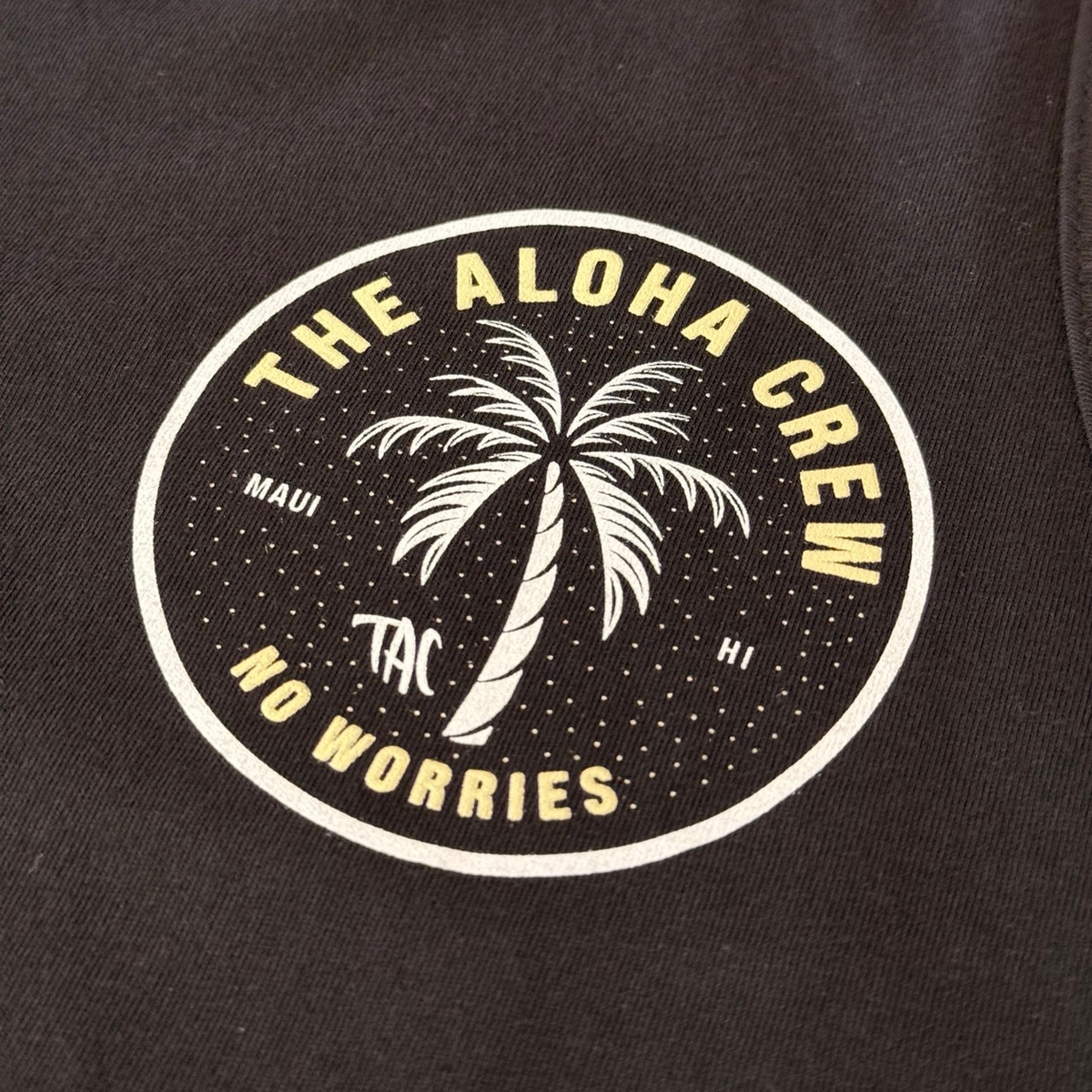 The Aloha Crew black tank top artwork detail